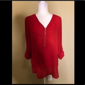 Woman’s Red Versona half Zip long sleeve top Sz M